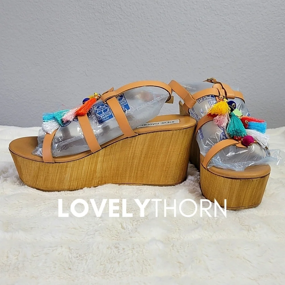 STEVE MADDEN // wooden platform tassel wedge sandals